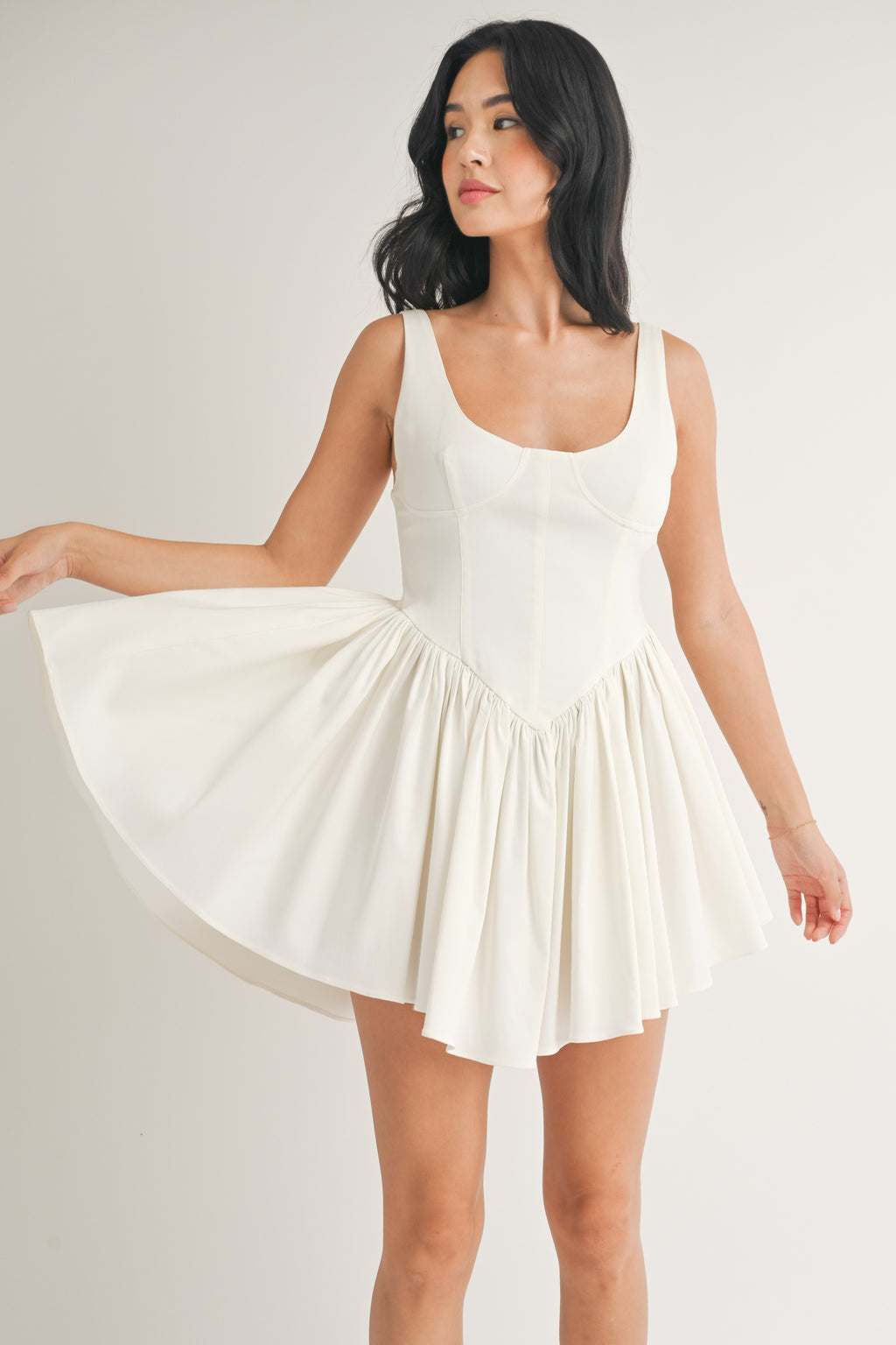 SLEEVELESS PLEATED FLARED MINI DRESS