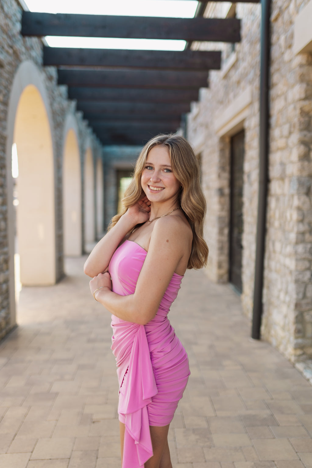 PINK STRAPLESS RUCHED MINI DRESS